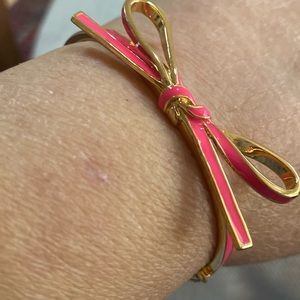 Kate Spade New York gold tone bracelet bangle Bow Thin Turnlock hinged vintage